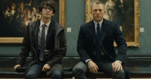 What Bond is thinking just before he finds out this is the new Q: "Why the hell did this guy sit RIGHT beside me? There's a whole rest of the gallery and he has to sit here?"